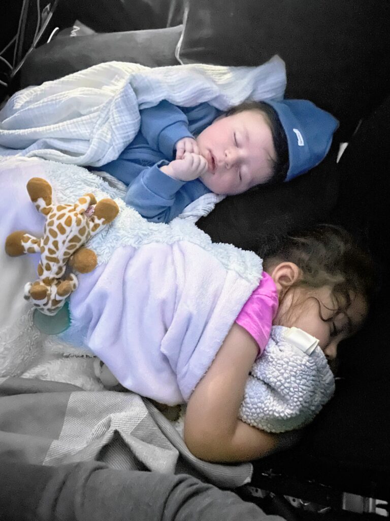 Kids having a snooze on the transatlantic flight